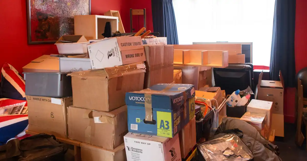 Packing boxes during a household declutter before an international move