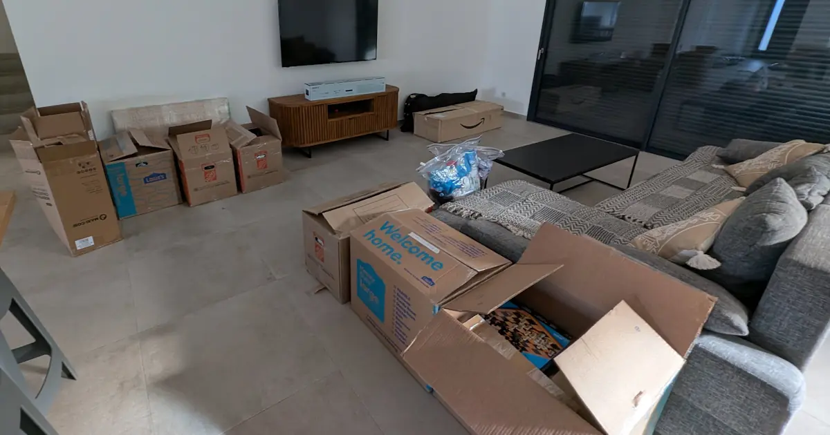 Packed boxes and luggage after an international move to France