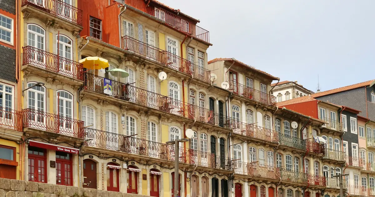Colorful apartment balconies on a street in Porto