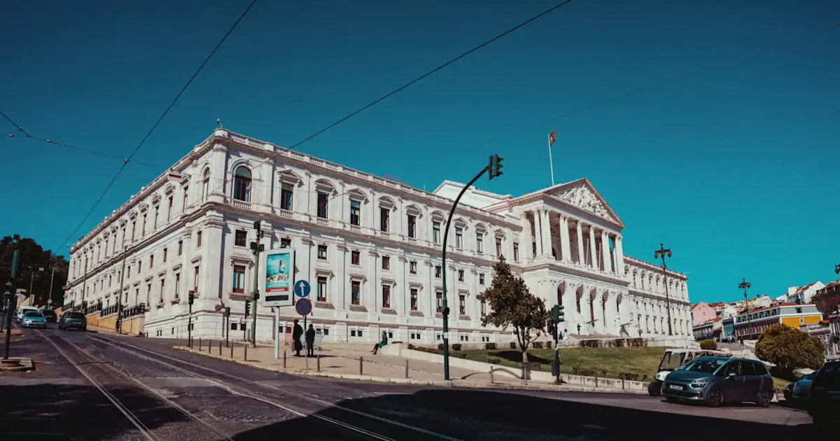 Street and stone buildings in central Lisbon on a clear day